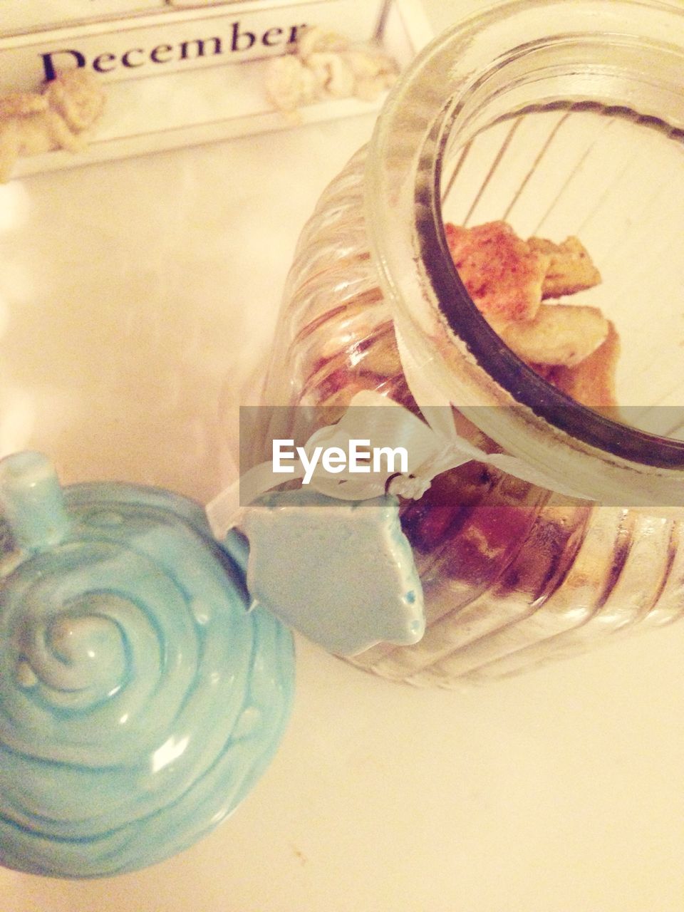 High angle view of sweets in jar on table