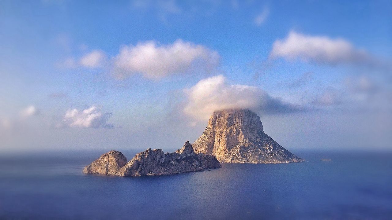 Elevated view of rock formations in sea