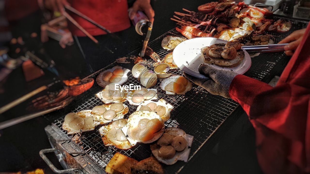 HIGH ANGLE VIEW OF PREPARING FOOD