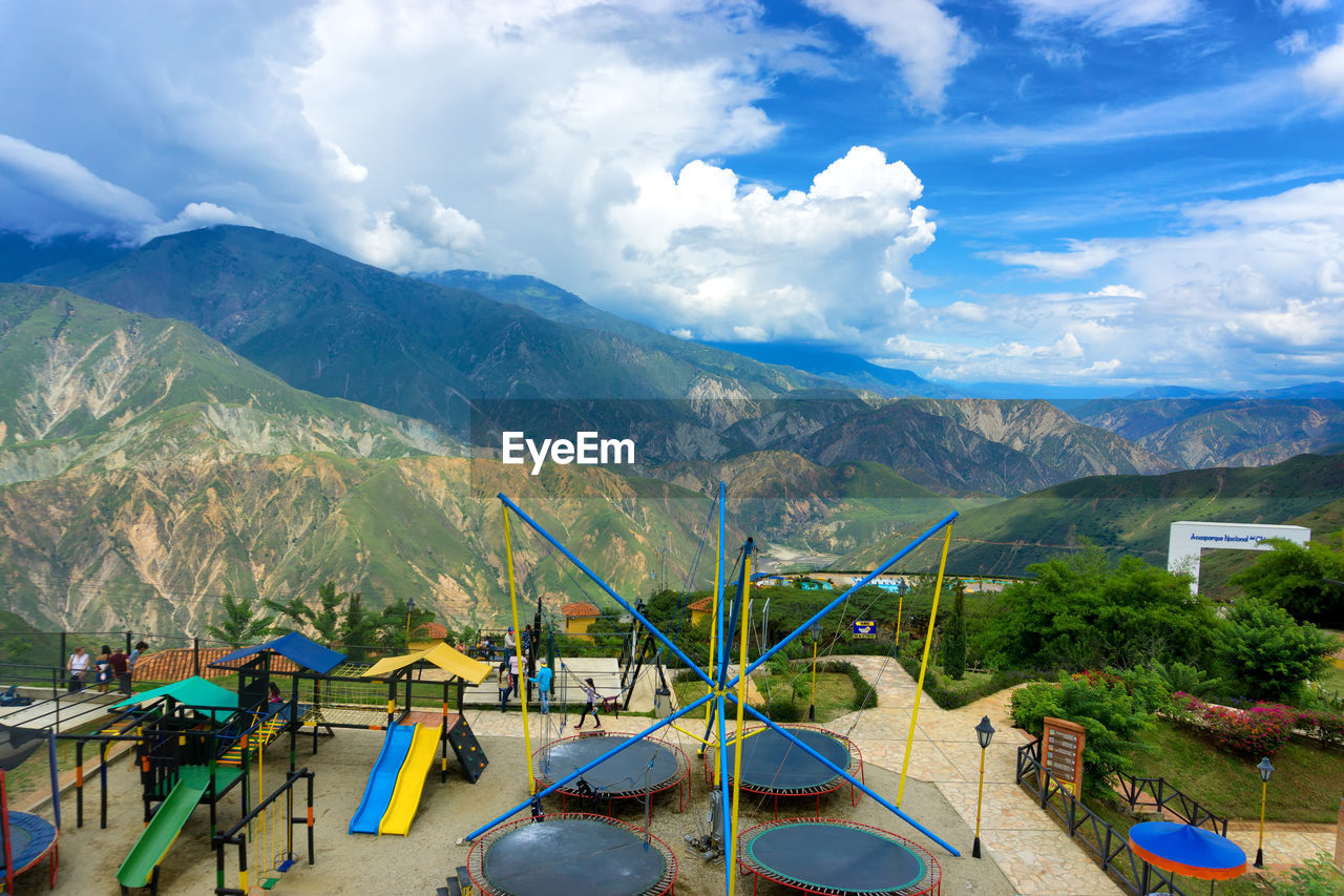 SCENIC VIEW OF MOUNTAIN RANGE AGAINST SKY