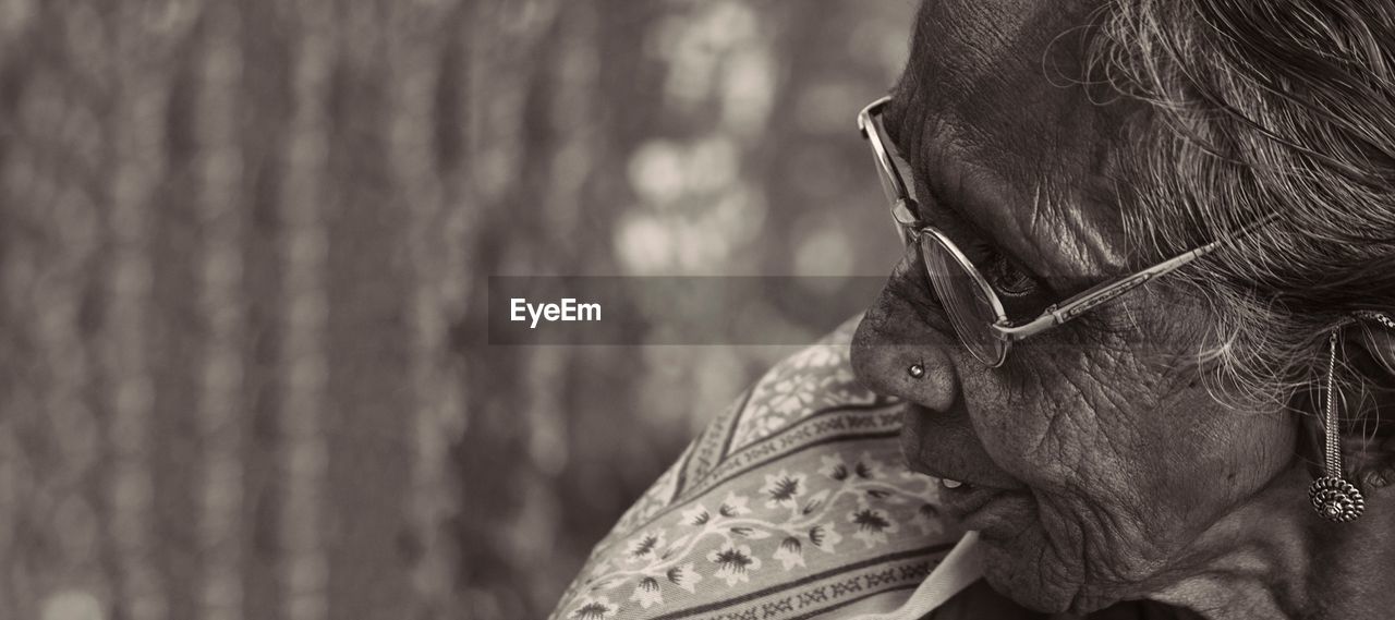 Close-up of senior woman wearing eyeglasses