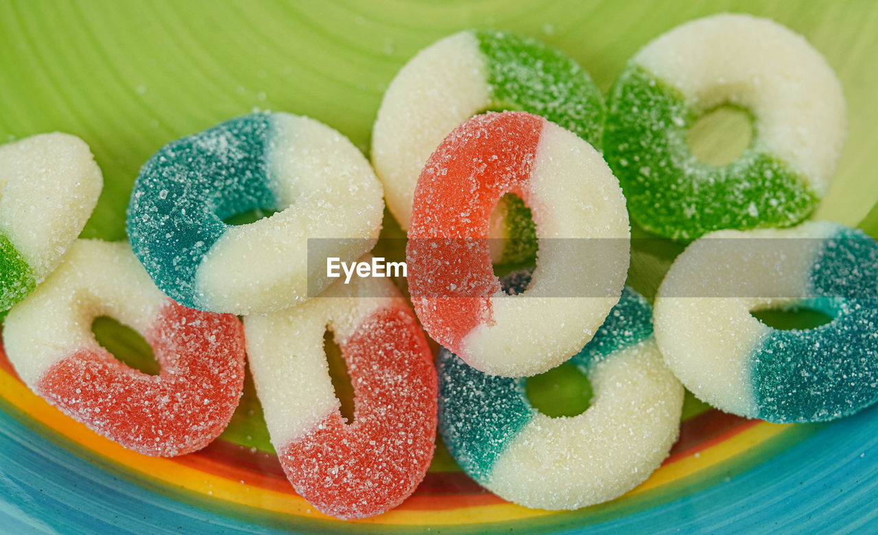 Close-up of multi colored candies in plate