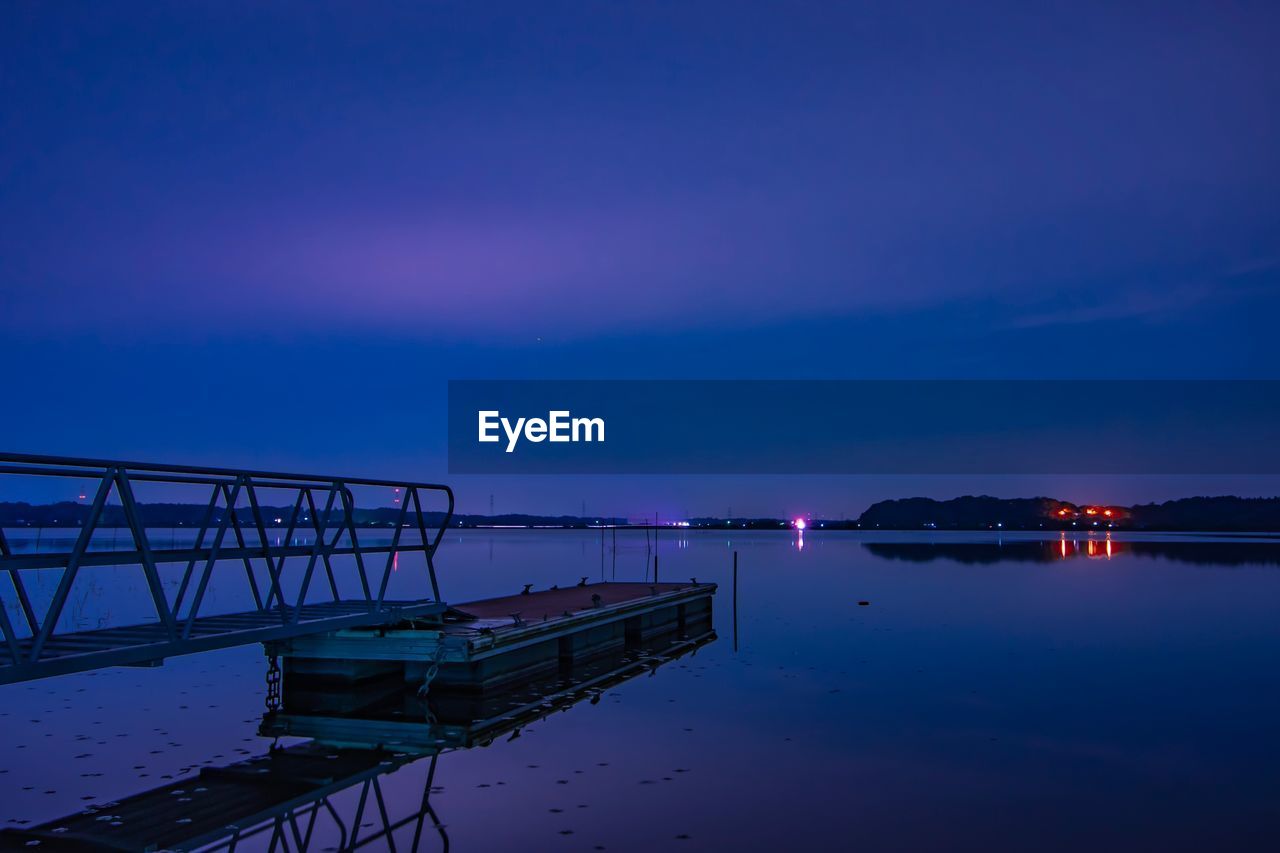 Scenic view of sea against sky at night