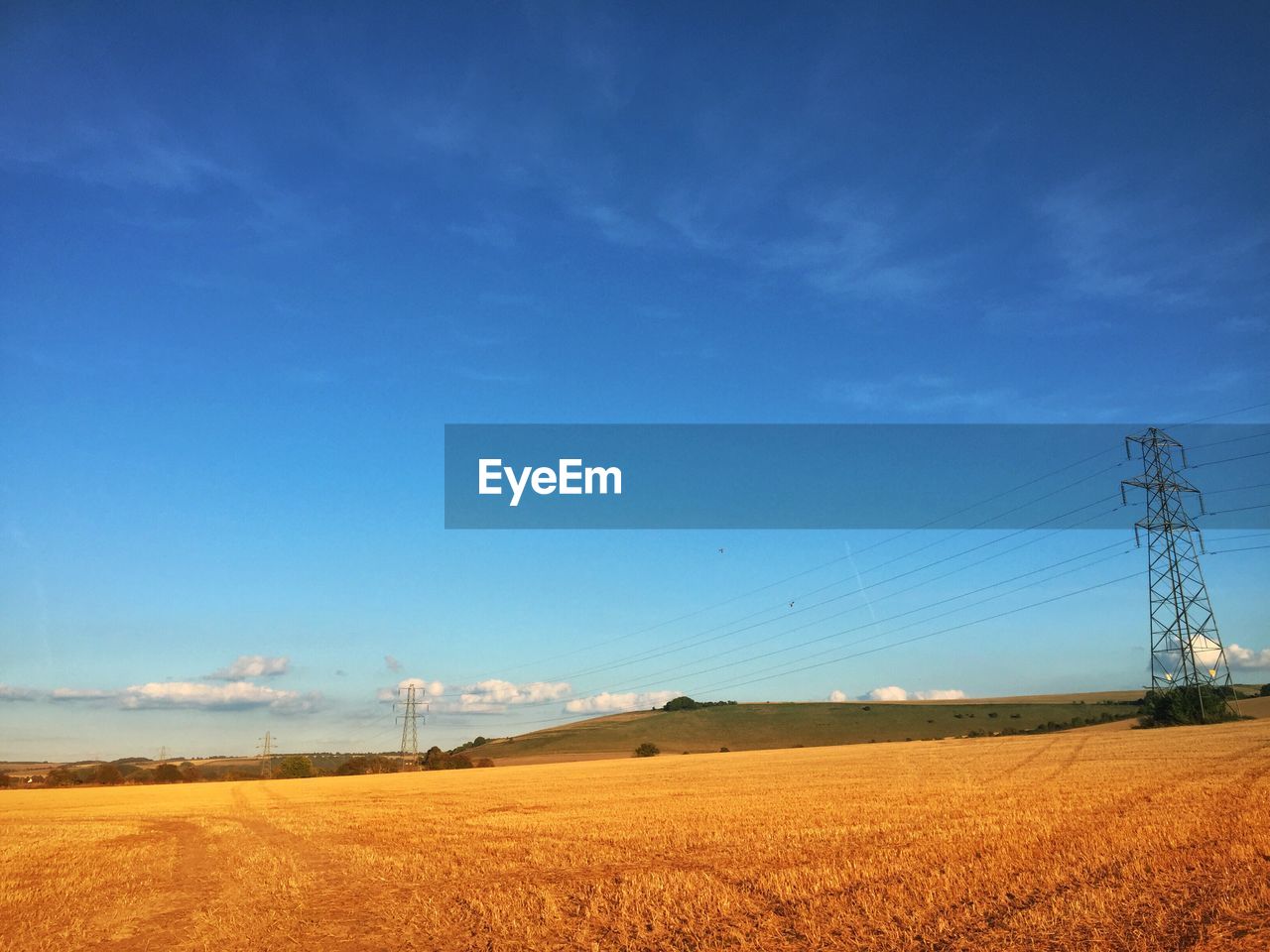 Scenic view of landscape against cloudy sky