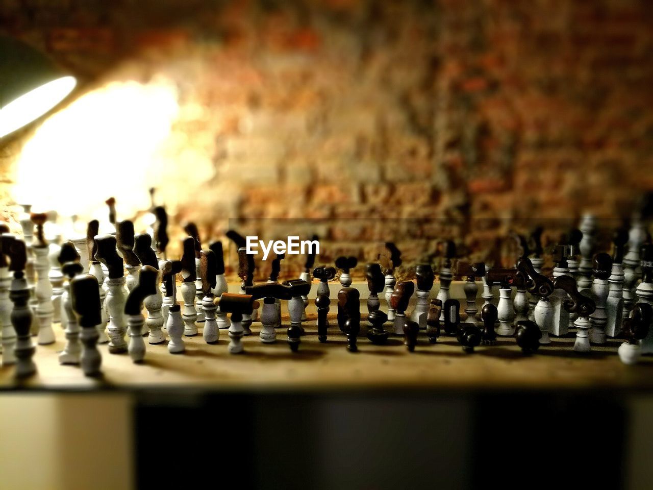 CLOSE-UP OF CHESS PIECES ON BOARD