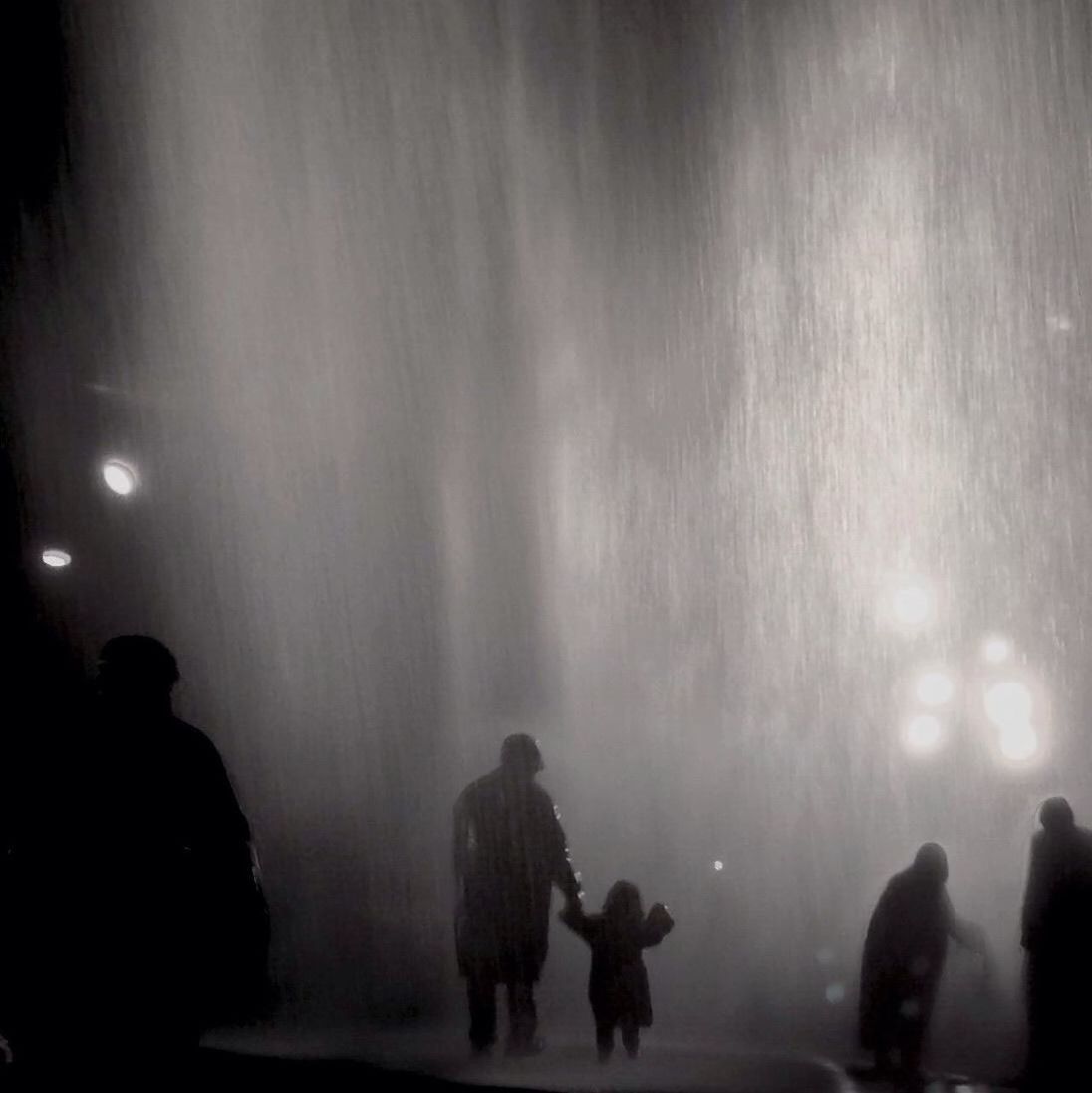 Silhouette people enjoying in instant structure for schacht xii at zollverein coal mine industrial complex