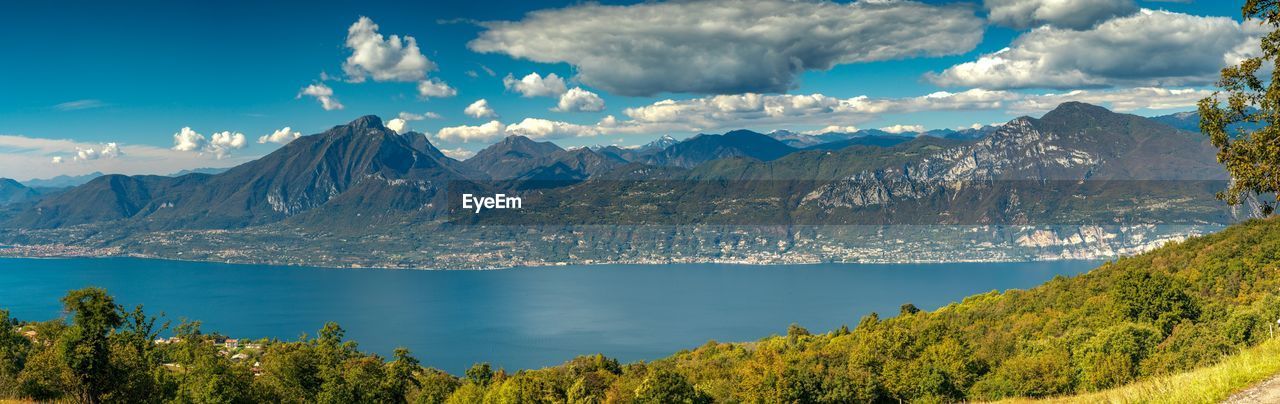 Panoramic view of lake and mountains against sky