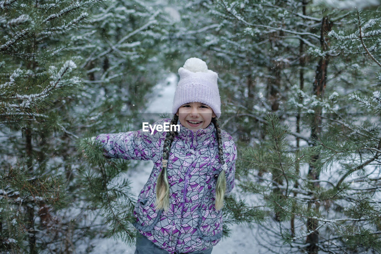 Portrait of smiling girl during winter