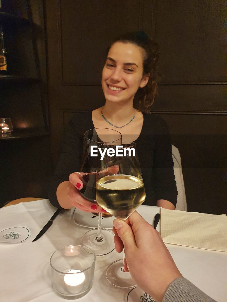Portrait of woman holding wineglass