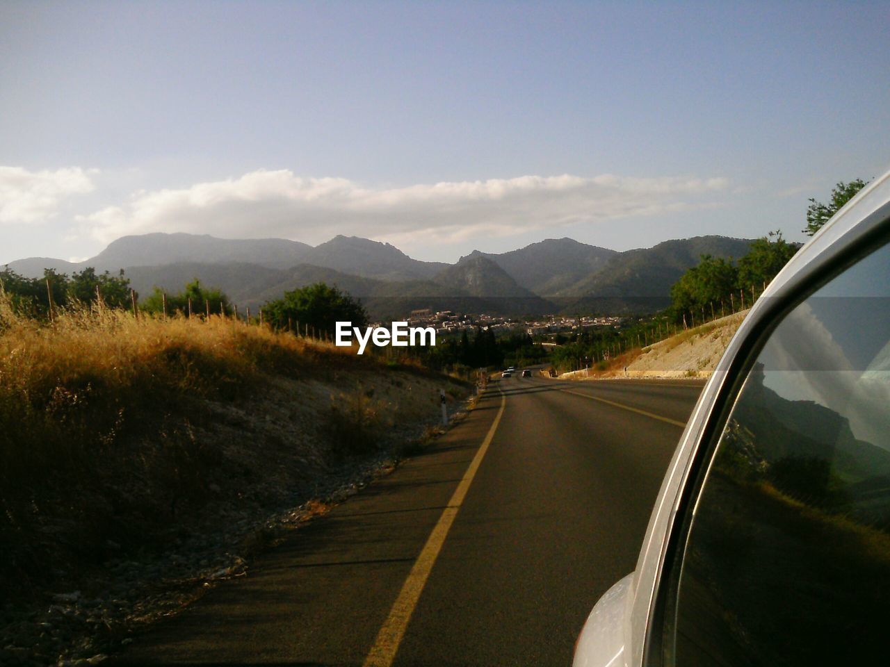 ROAD PASSING THROUGH LANDSCAPE