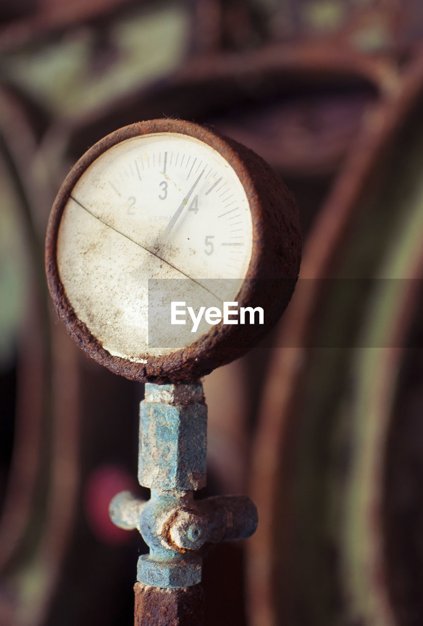 Close-up of rusty pressure gauge