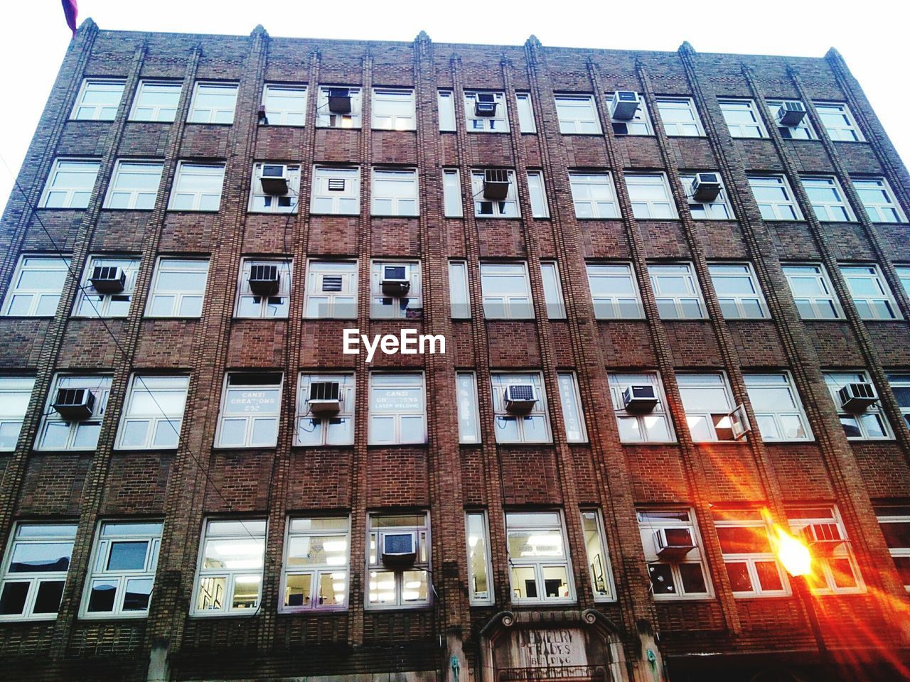 LOW ANGLE VIEW OF APARTMENT BUILDING