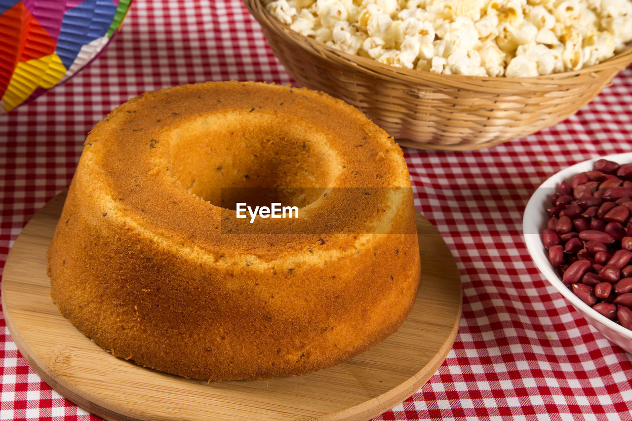 HIGH ANGLE VIEW OF BREAKFAST SERVED IN BASKET ON TABLE