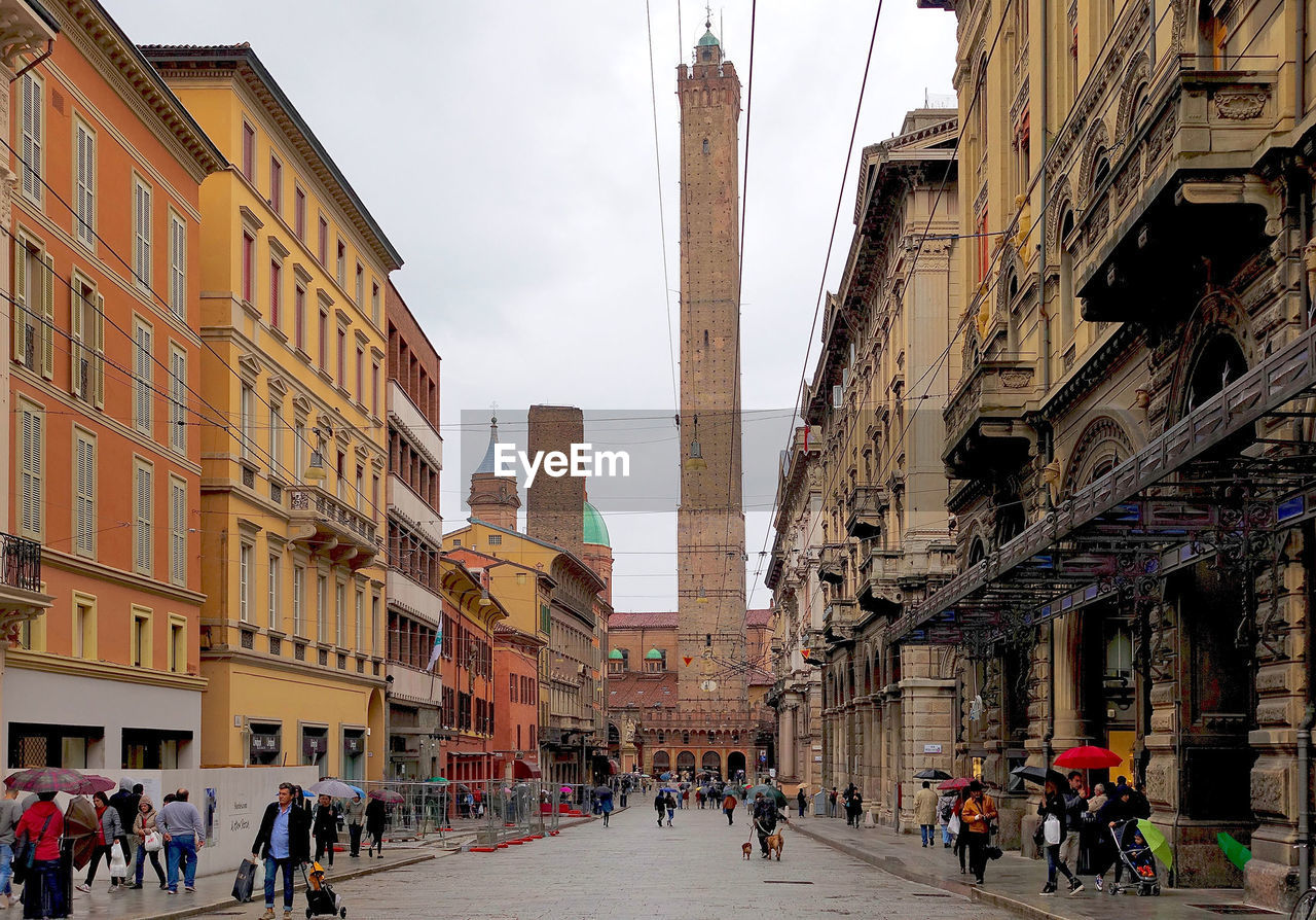 People at town street with historic buildings