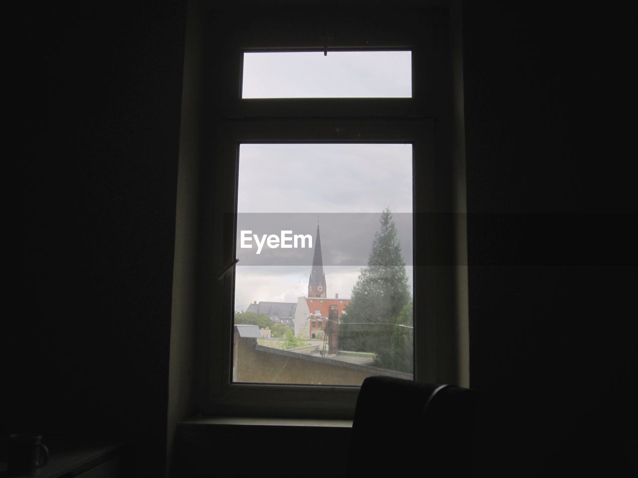 CITY SEEN THROUGH WINDOW