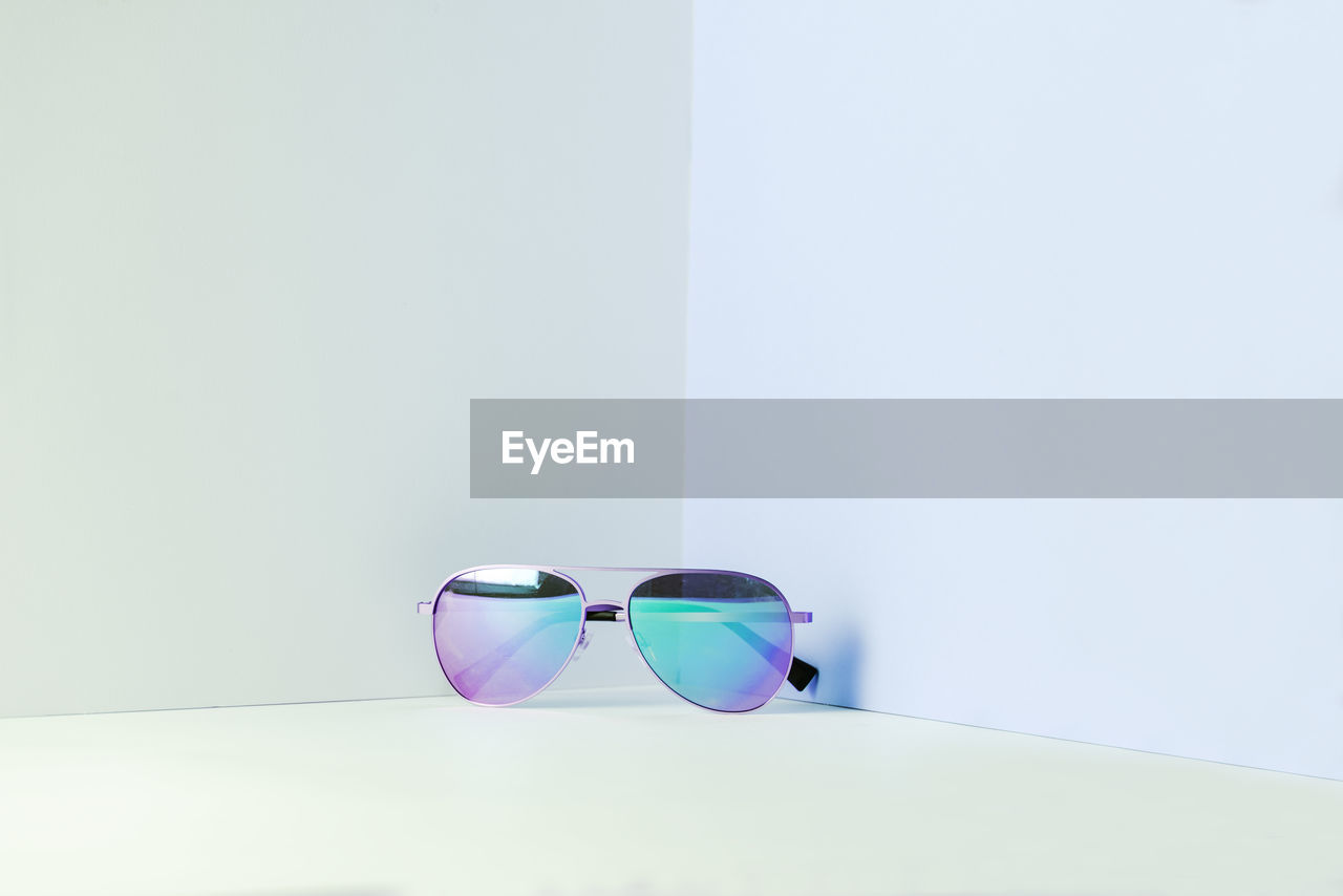 Close-up of sunglasses on white background