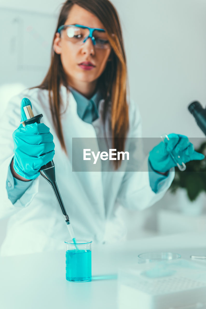 Young woman working in laboratory