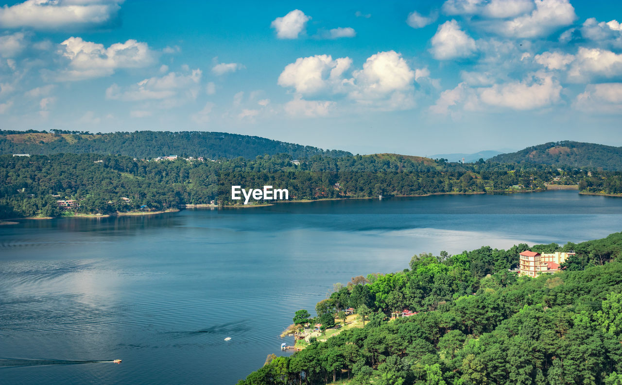 Serene lake with mountain background at day from top angle