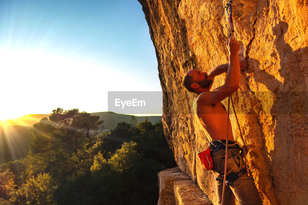 Climber clipping the rope