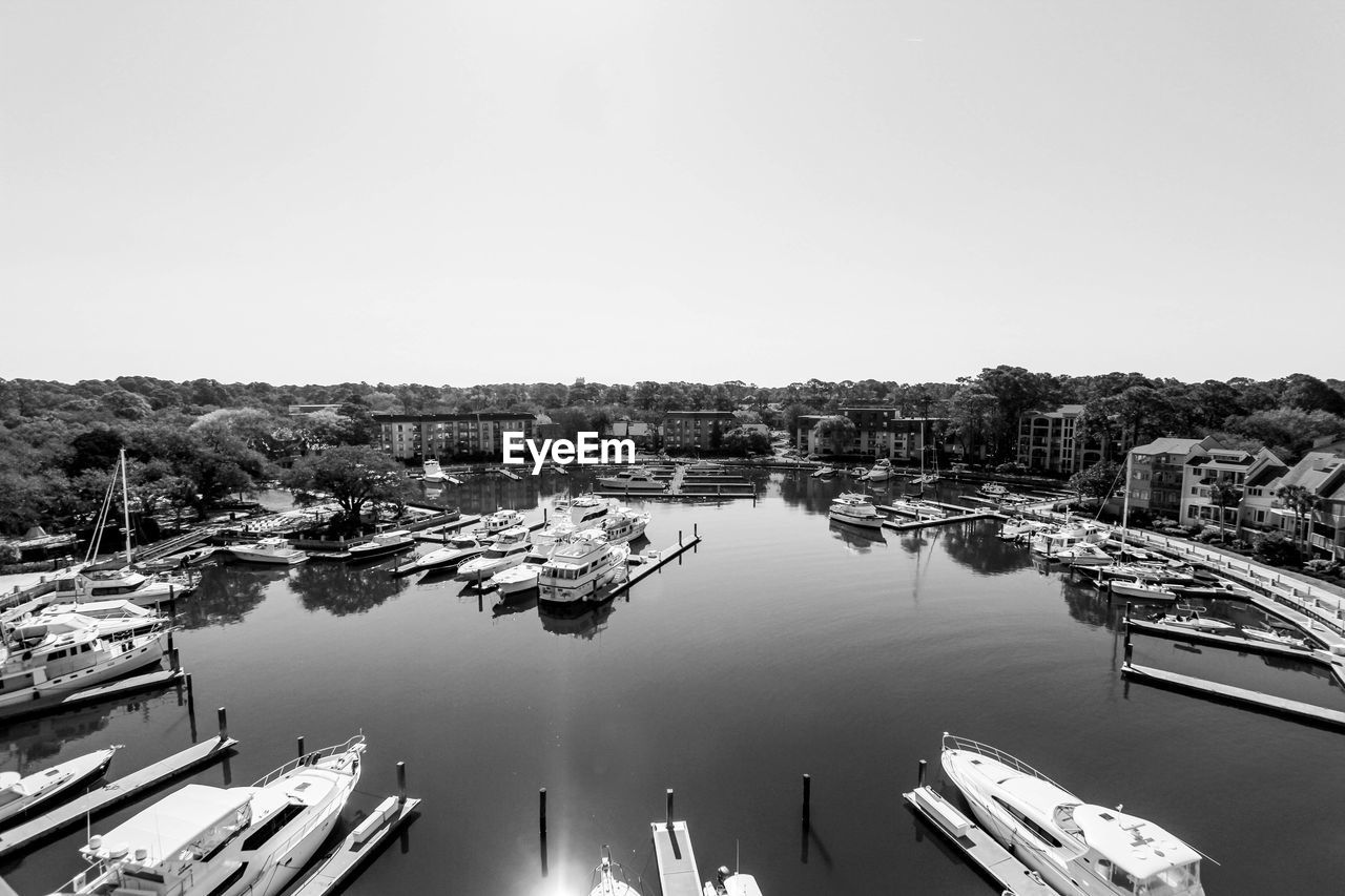 High angle view of boats moored in harbor