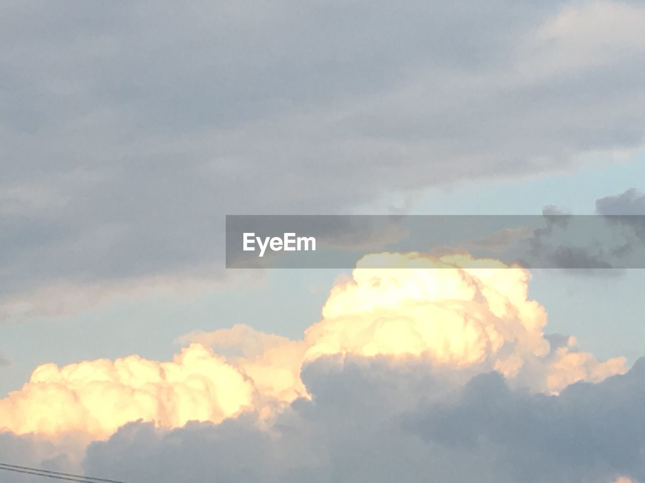 LOW ANGLE VIEW OF SKY AGAINST CLOUDS