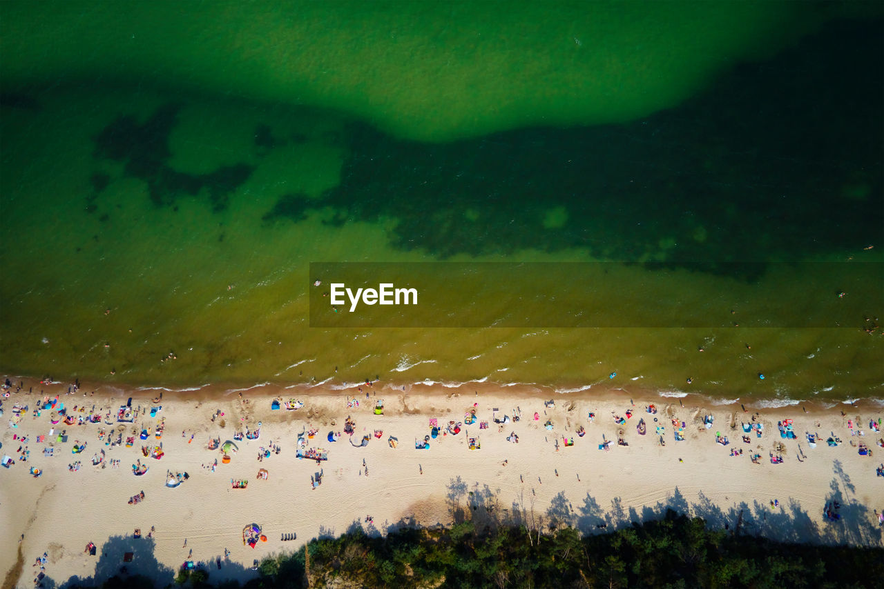 Aerial view of sea landscape with crowded sand beach in wladyslawowo. baltic sea coastline 