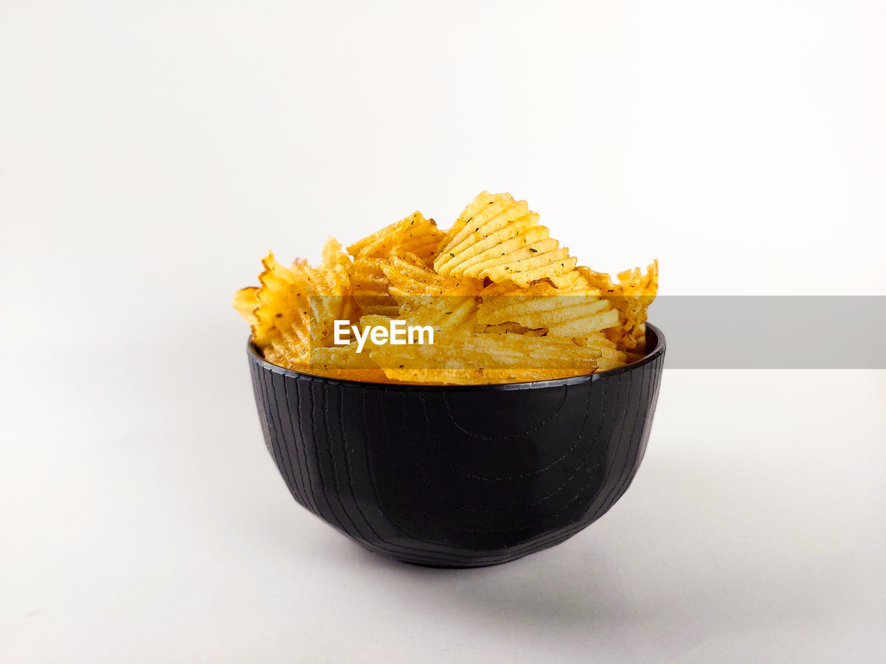 food and drink, food, fast food, dish, studio shot, white background, junk food, snack, potato chip, cuisine, bowl, produce, unhealthy eating, indoors, no people, cut out, tortilla chip, freshness, yellow, raw potato, breakfast