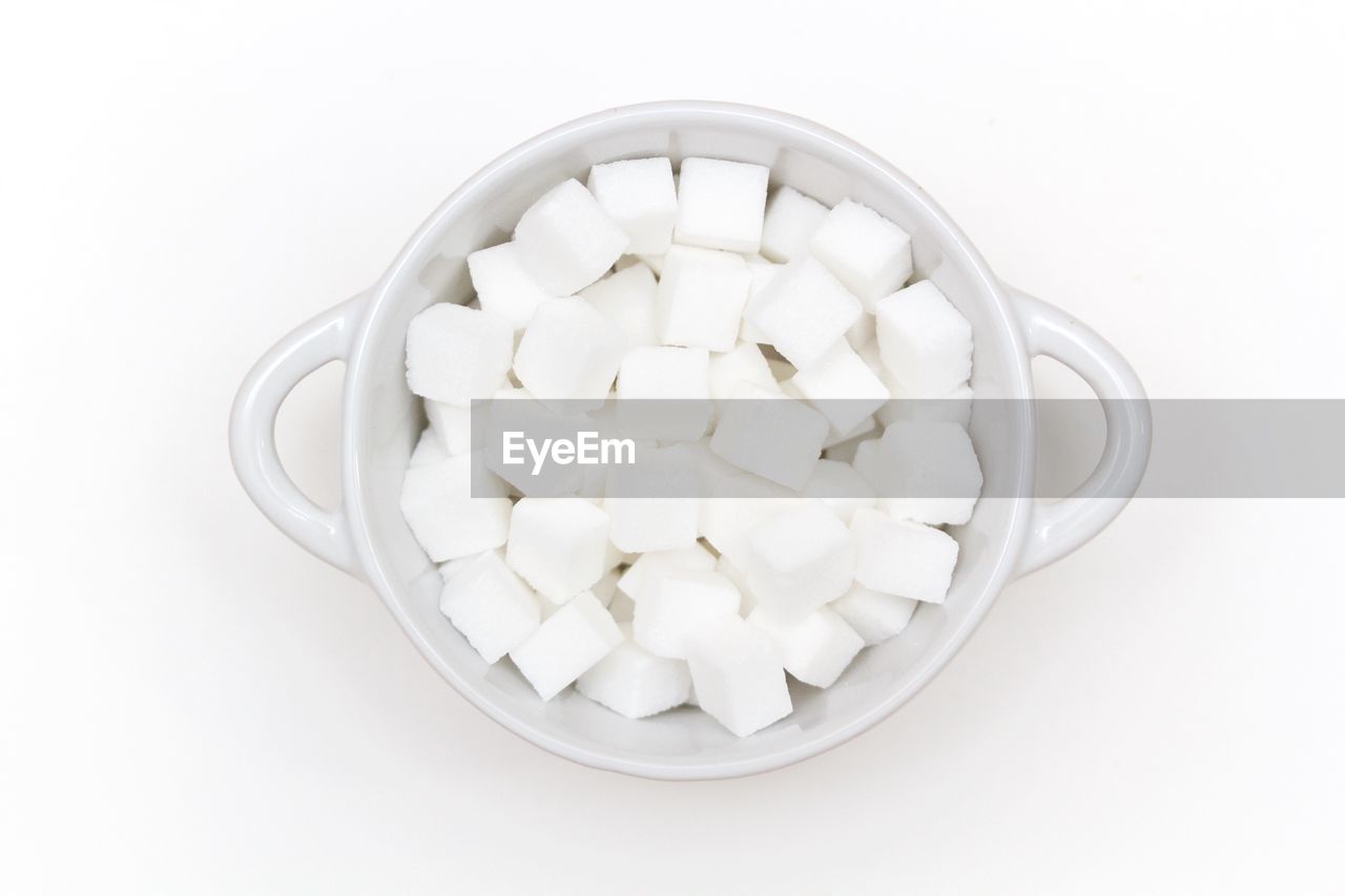 HIGH ANGLE VIEW OF ICE CREAM IN WHITE BACKGROUND