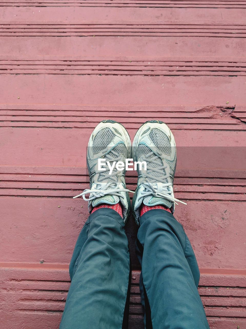 Low section of man in shoes on staircase