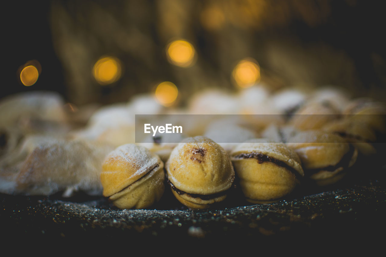 Moody picture of traditional christmas bakeries on a place with bokeh effect and cozy atmosphere.