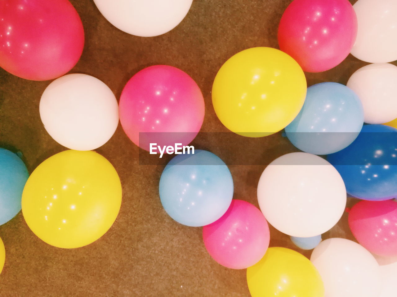 CLOSE-UP OF COLORFUL BALLOONS