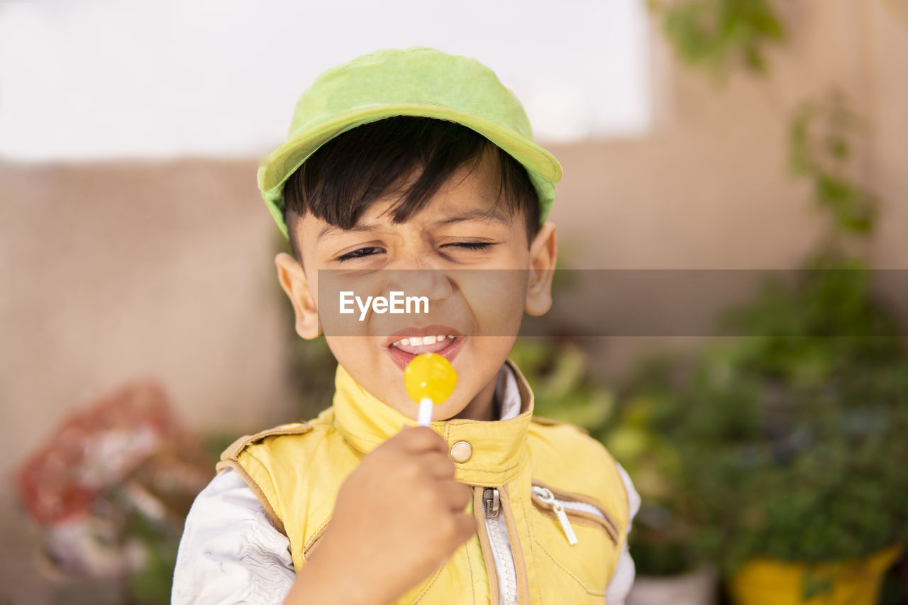 Portrait of cute boy outdoors