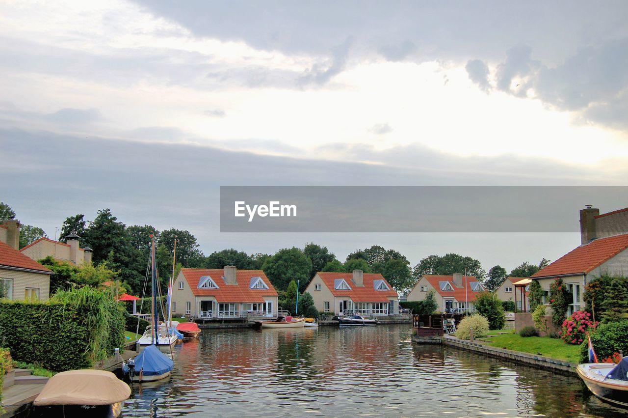 River with houses in distance