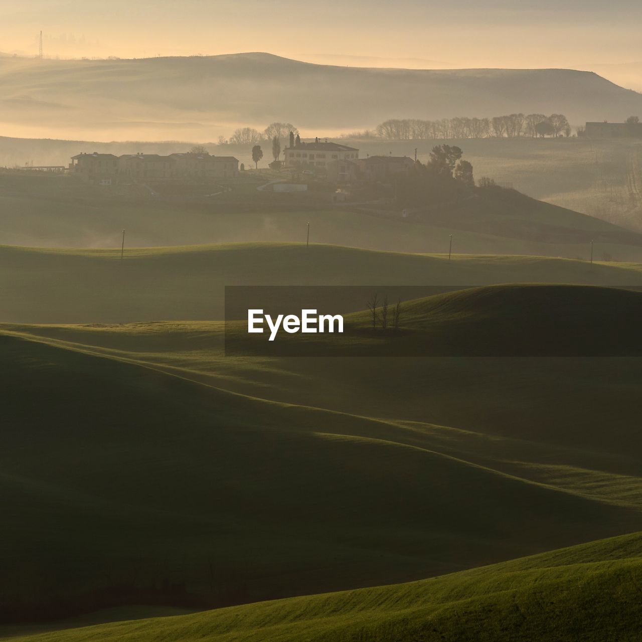 Scenic view of landscape against sky during sunset