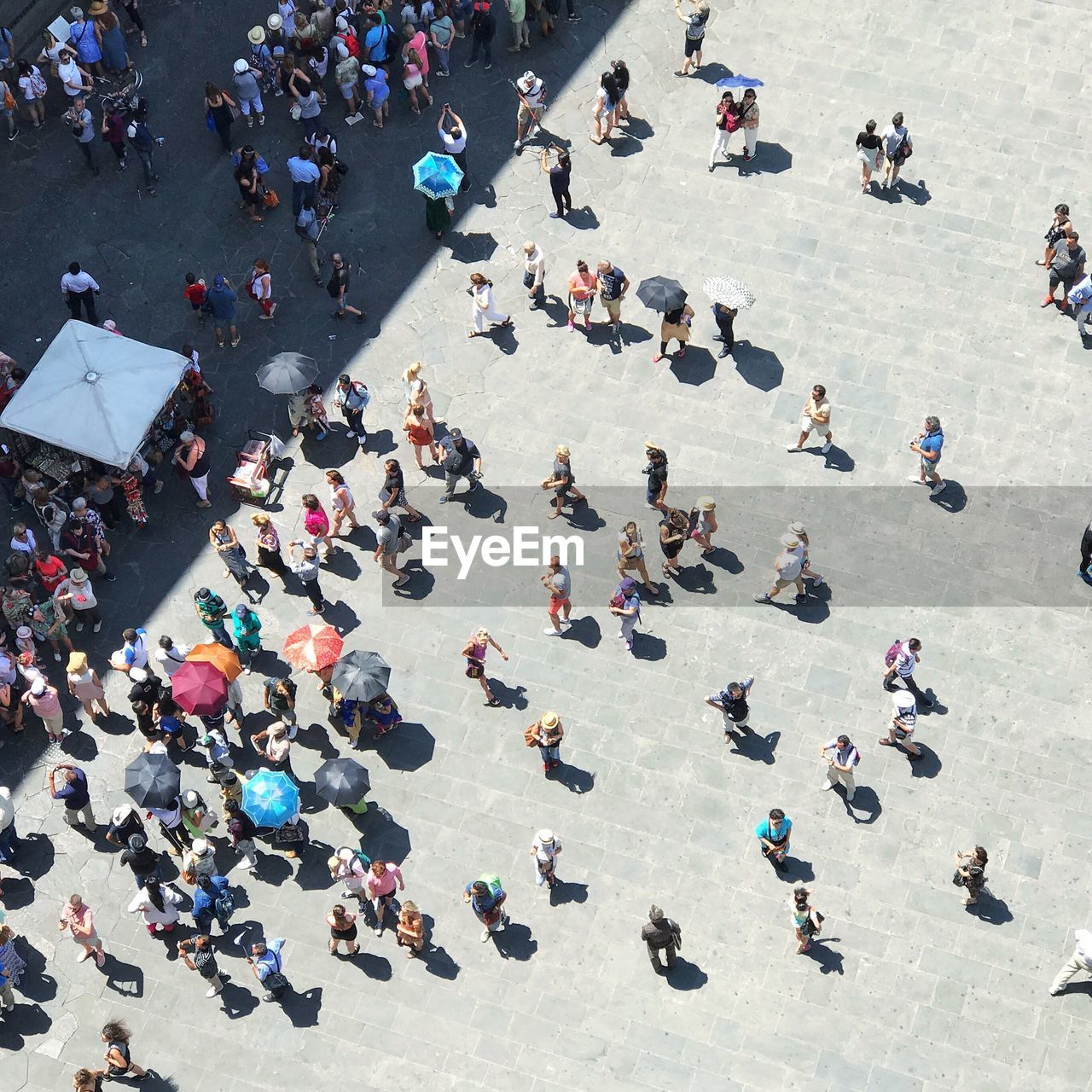 High angle view of people walking on street in florence, italy, piazza della signoria