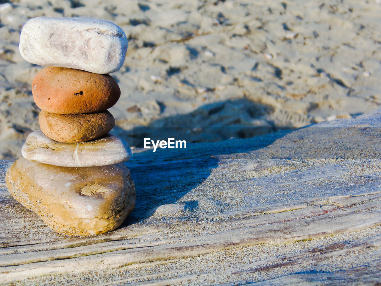 STACK OF ROCKS ON SHORE