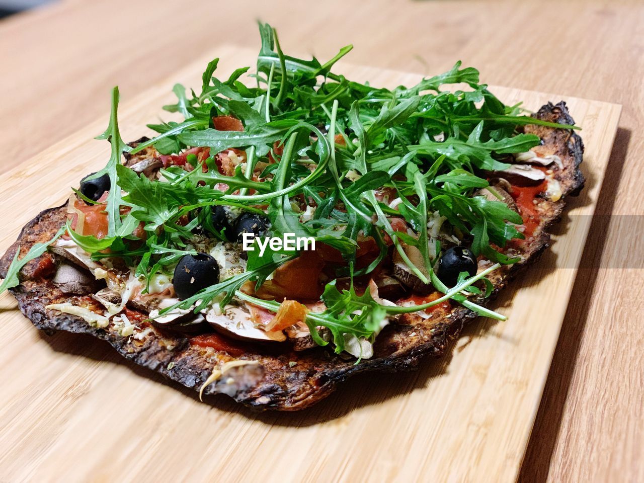 HIGH ANGLE VIEW OF PIZZA IN BOWL ON TABLE