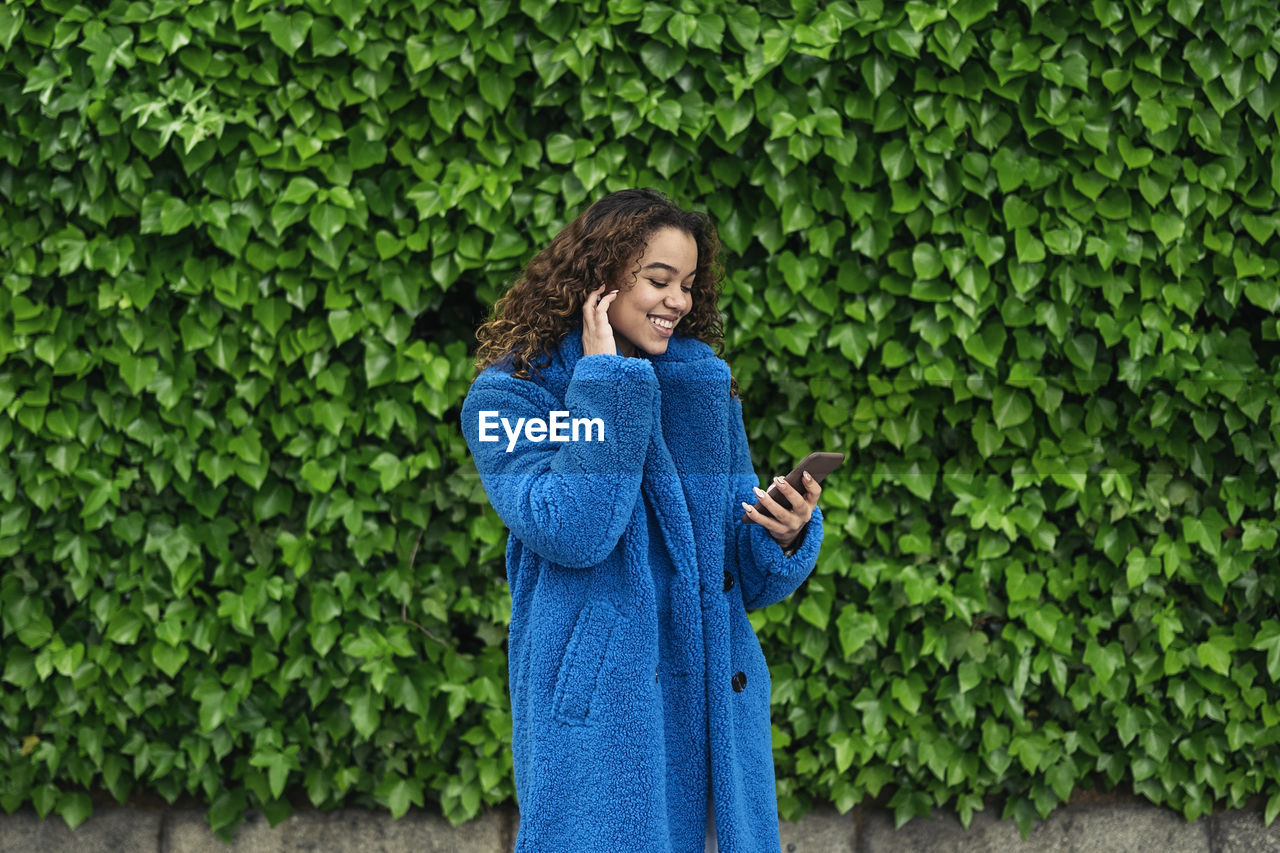 Happy woman looking at camera