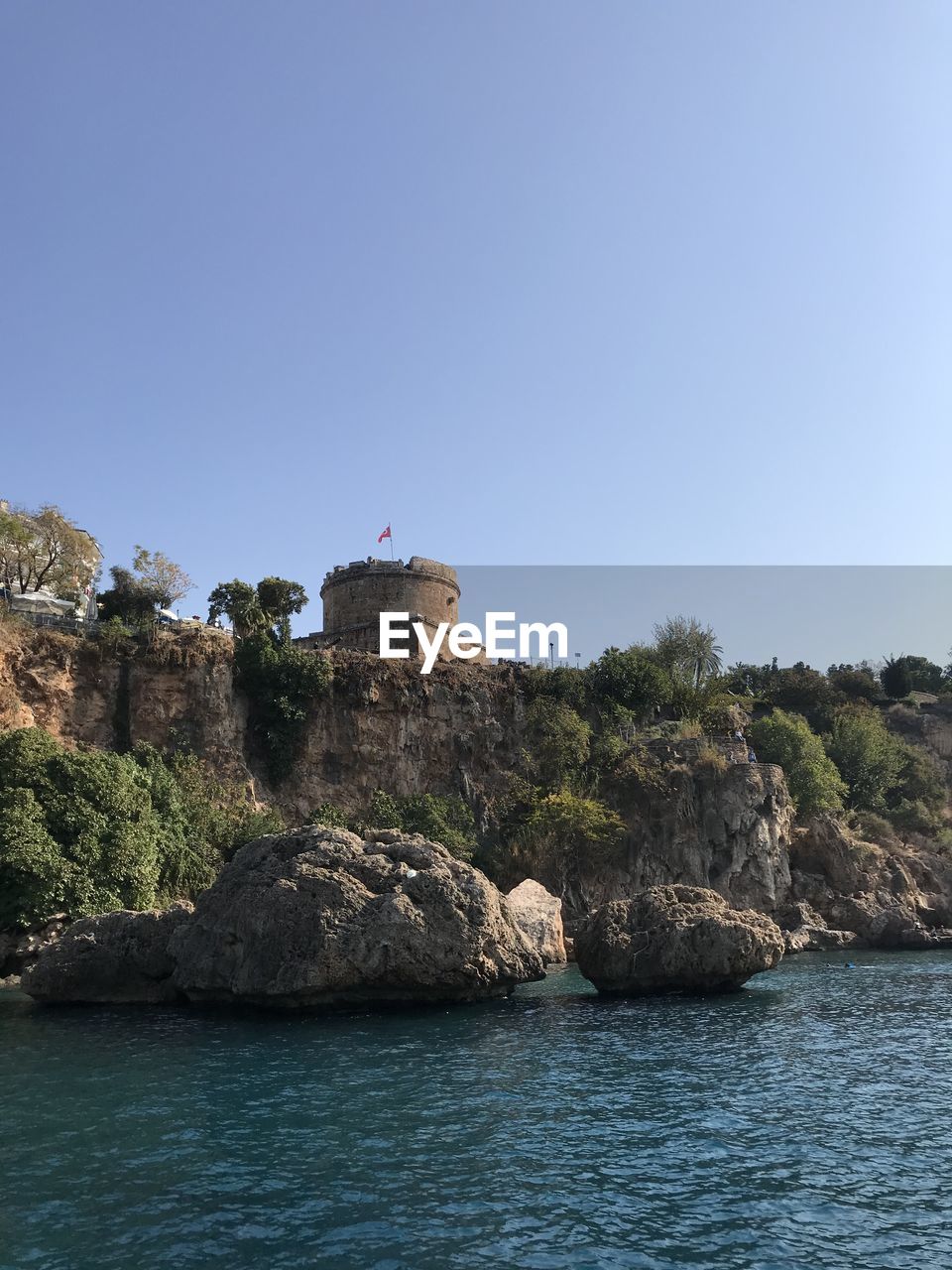 VIEW OF BUILDING BY SEA