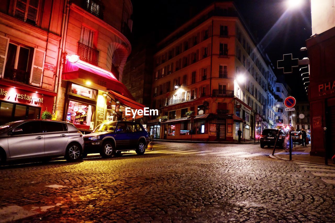 VIEW OF STREET AT NIGHT