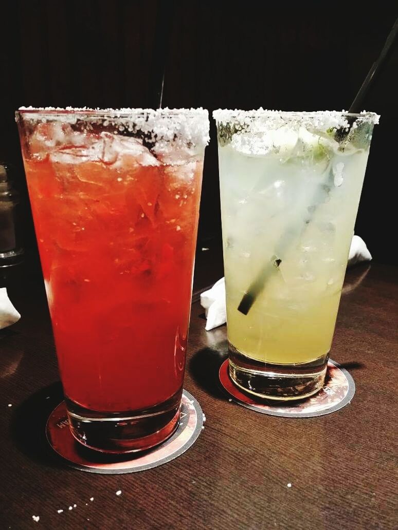 CLOSE-UP OF DRINK ON TABLE