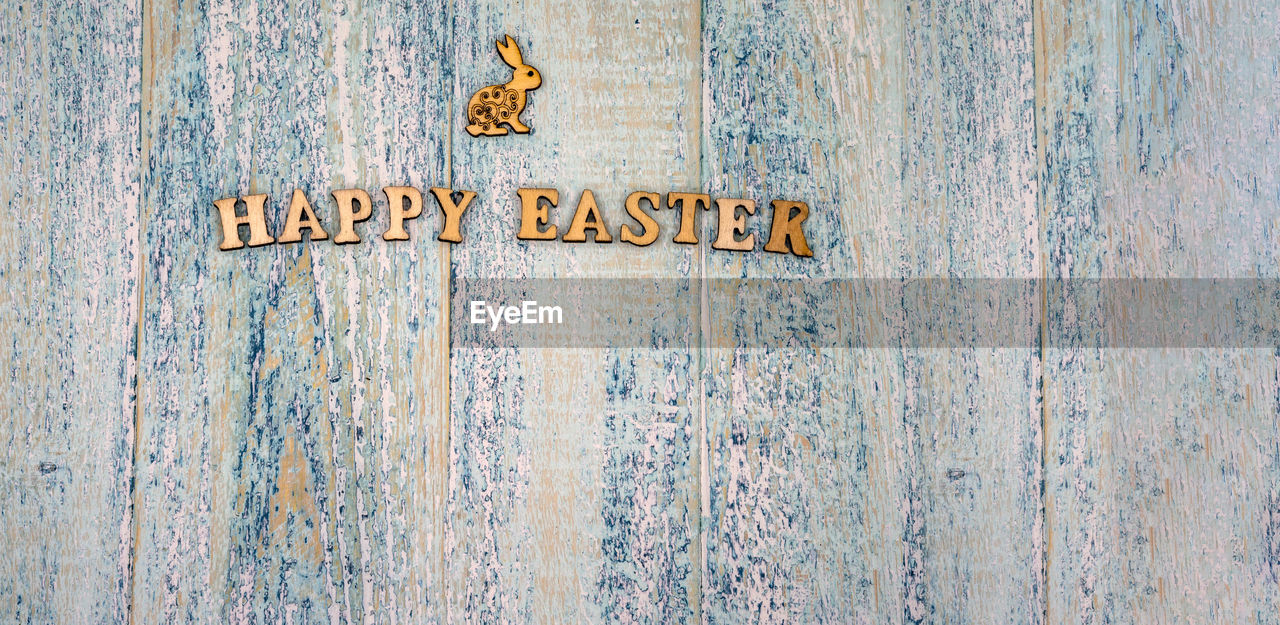 The easter bunny. holy easter. blue turquoise background. happy easter