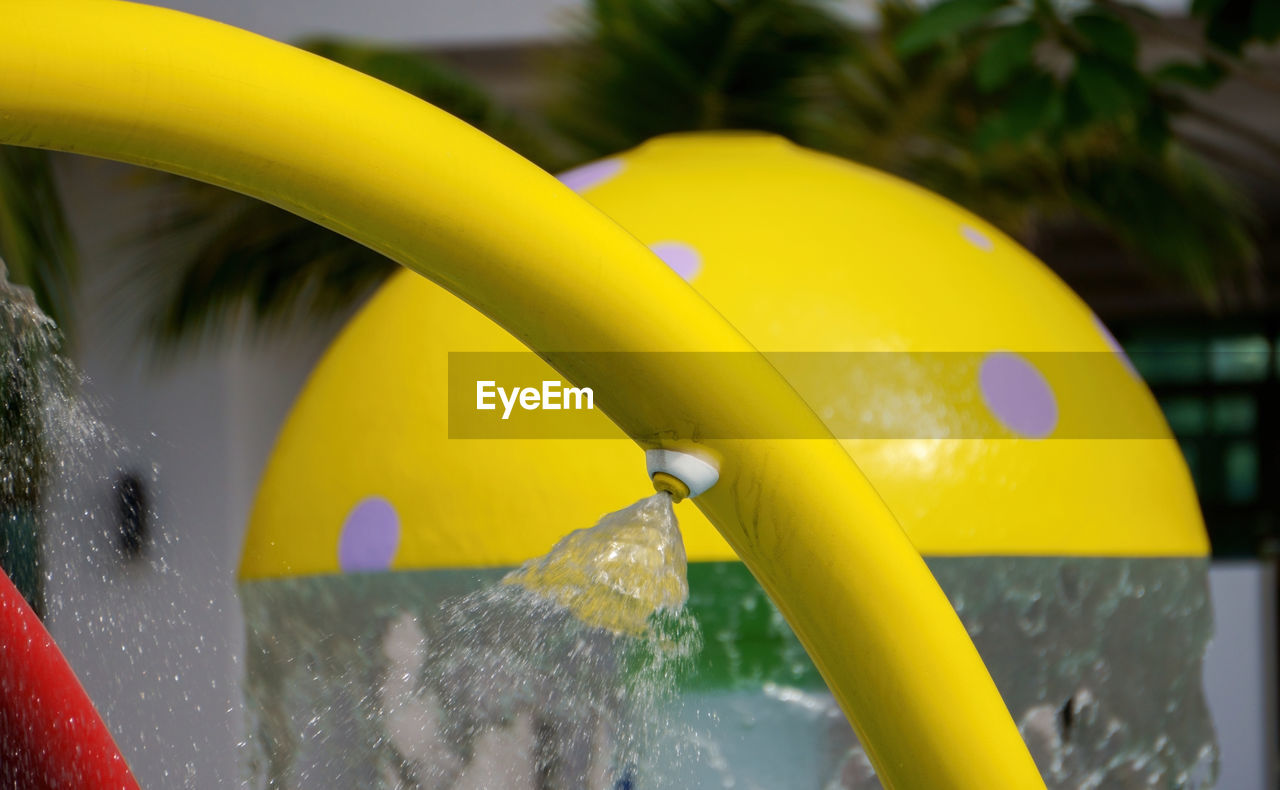 yellow, water, nature, wet, green, close-up, outdoors, motion, drop, tropical climate, no people, playground, day