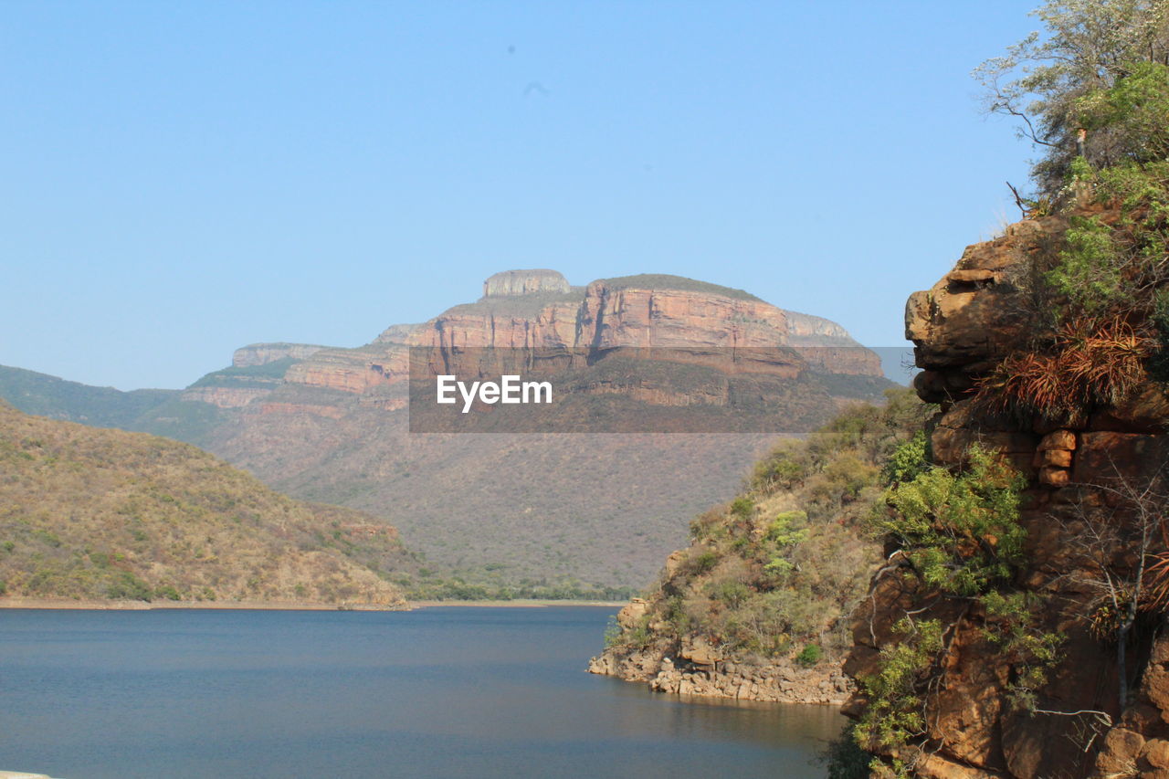 SCENIC VIEW OF MOUNTAIN AGAINST SKY