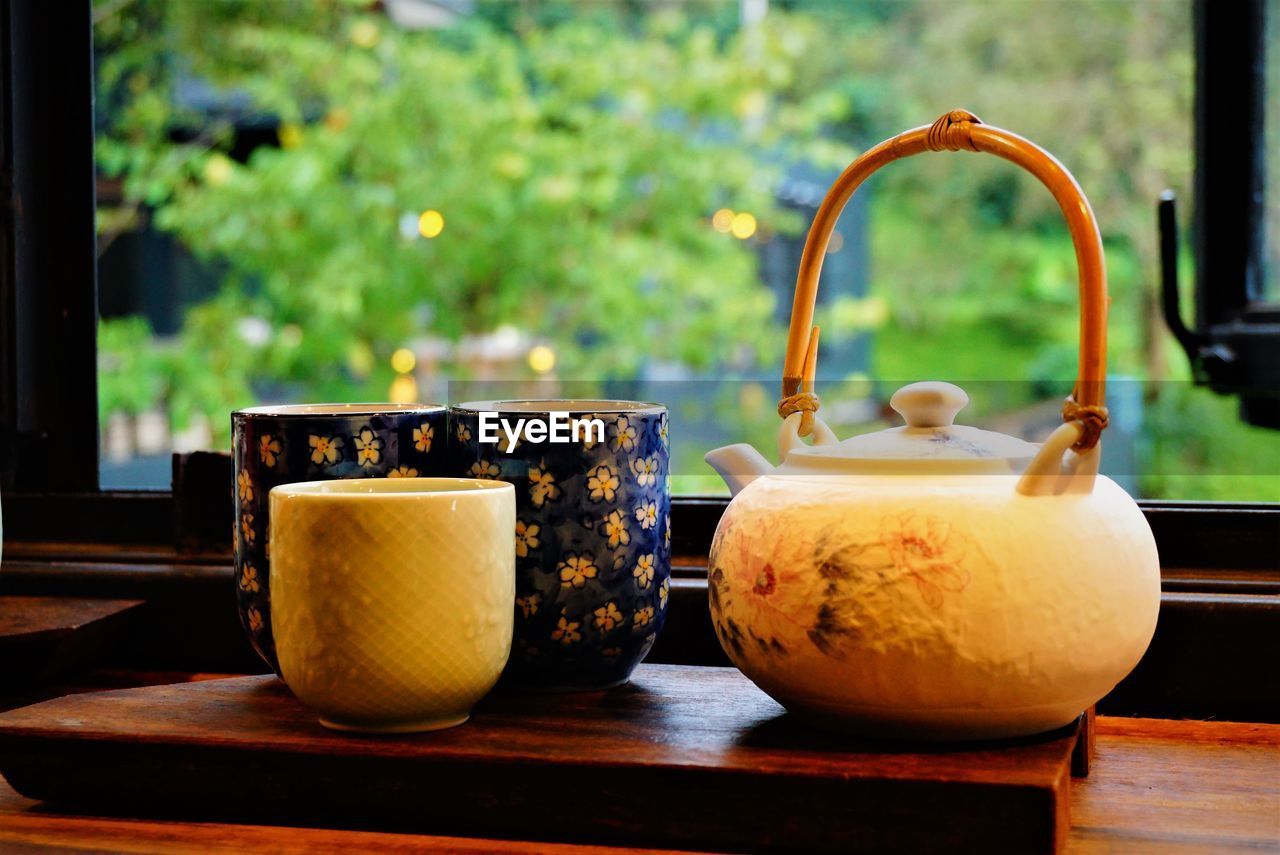 Close-up of crockery on table