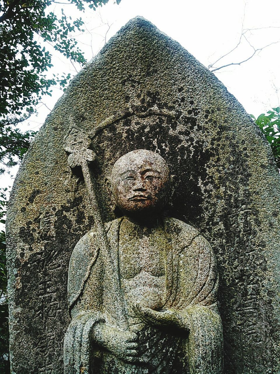 LOW ANGLE VIEW OF STATUE