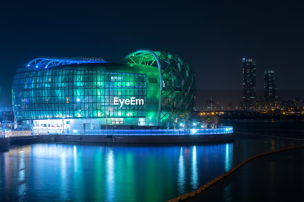 ILLUMINATED BUILDINGS AT NIGHT