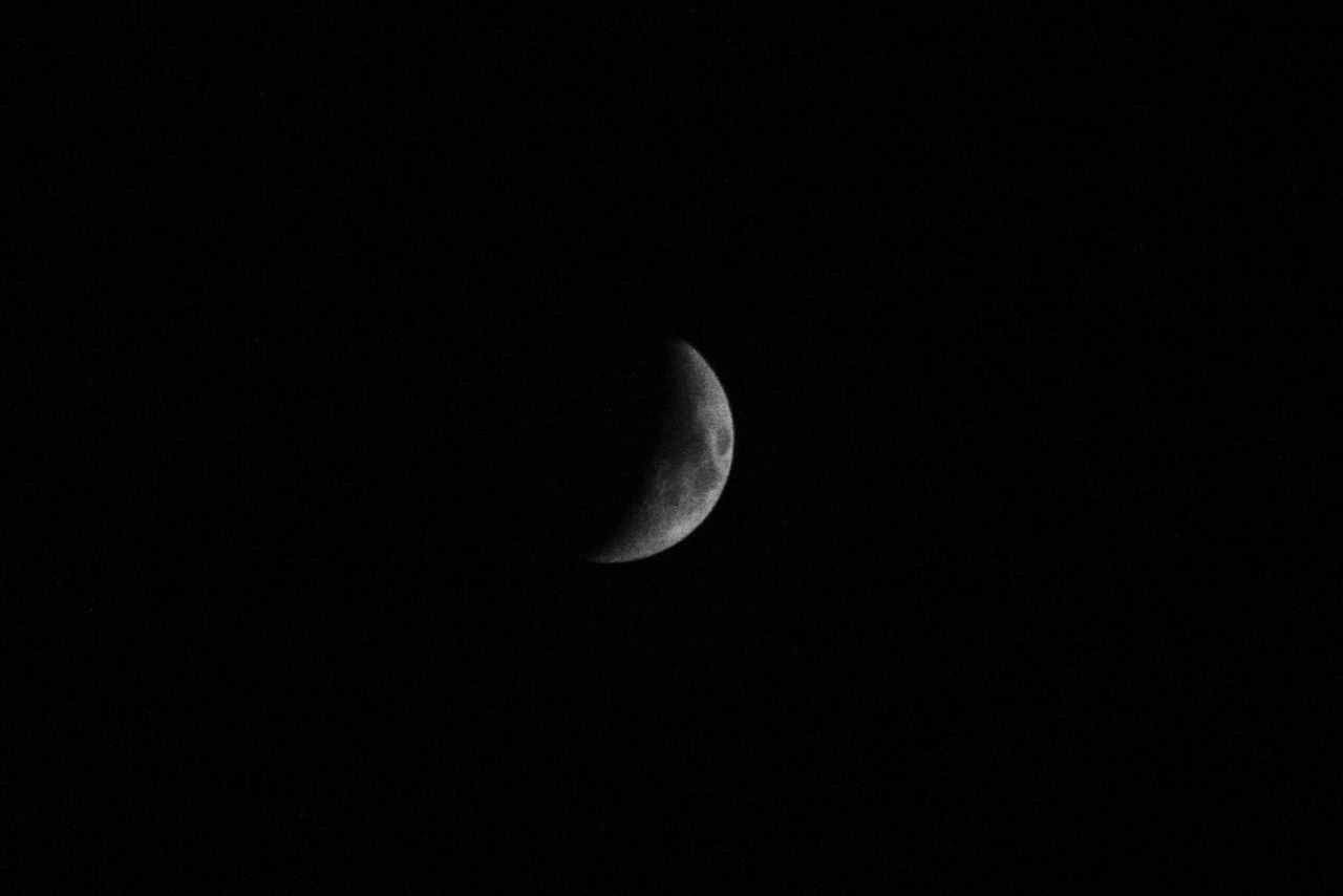 LOW ANGLE VIEW OF MOON AGAINST SKY AT NIGHT