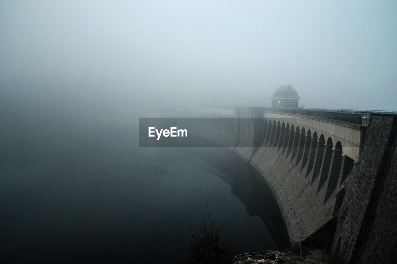 Scenic view of dam against sky