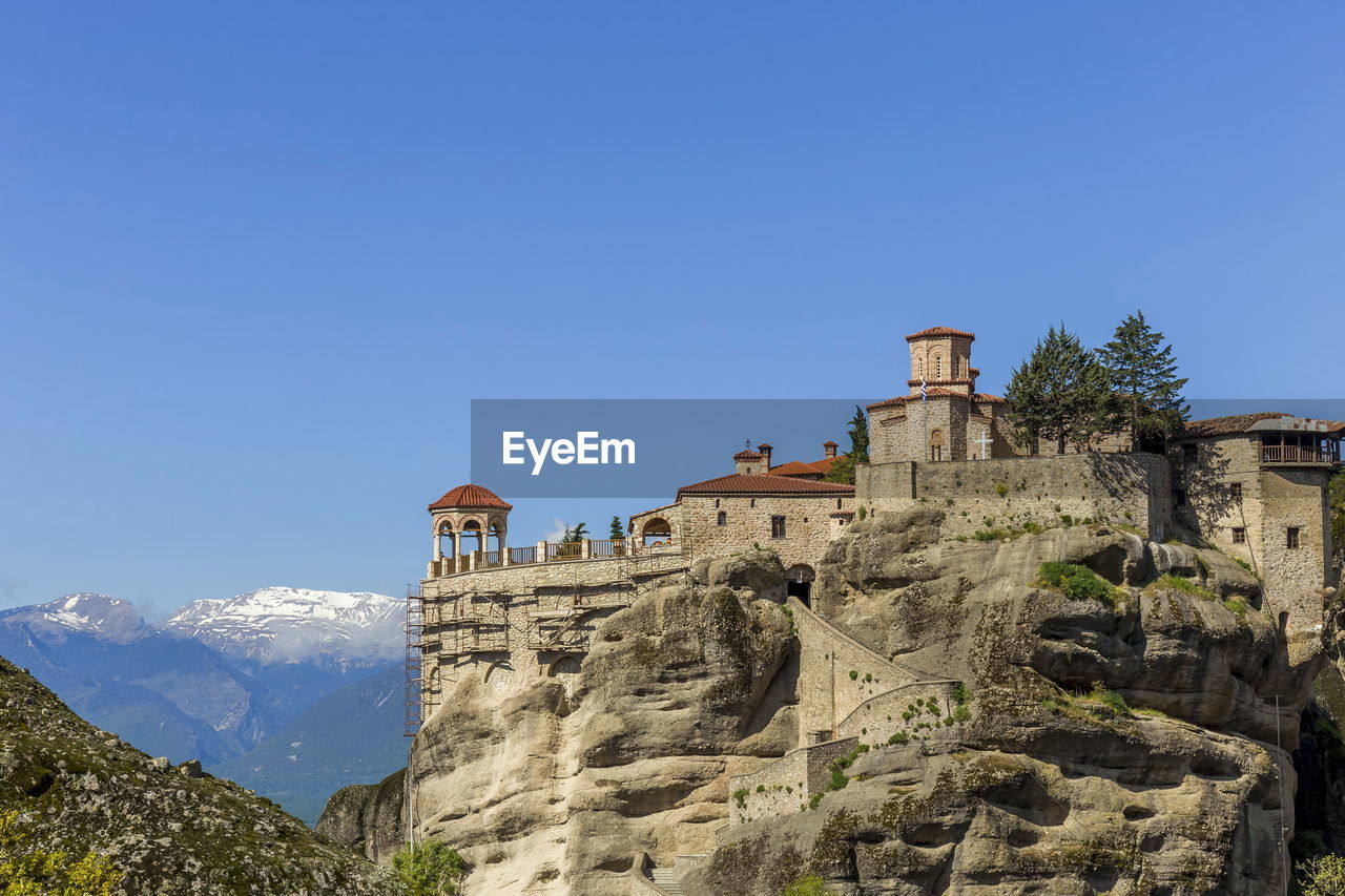 Famous meteora - the 8th wonder of the world against clear sky